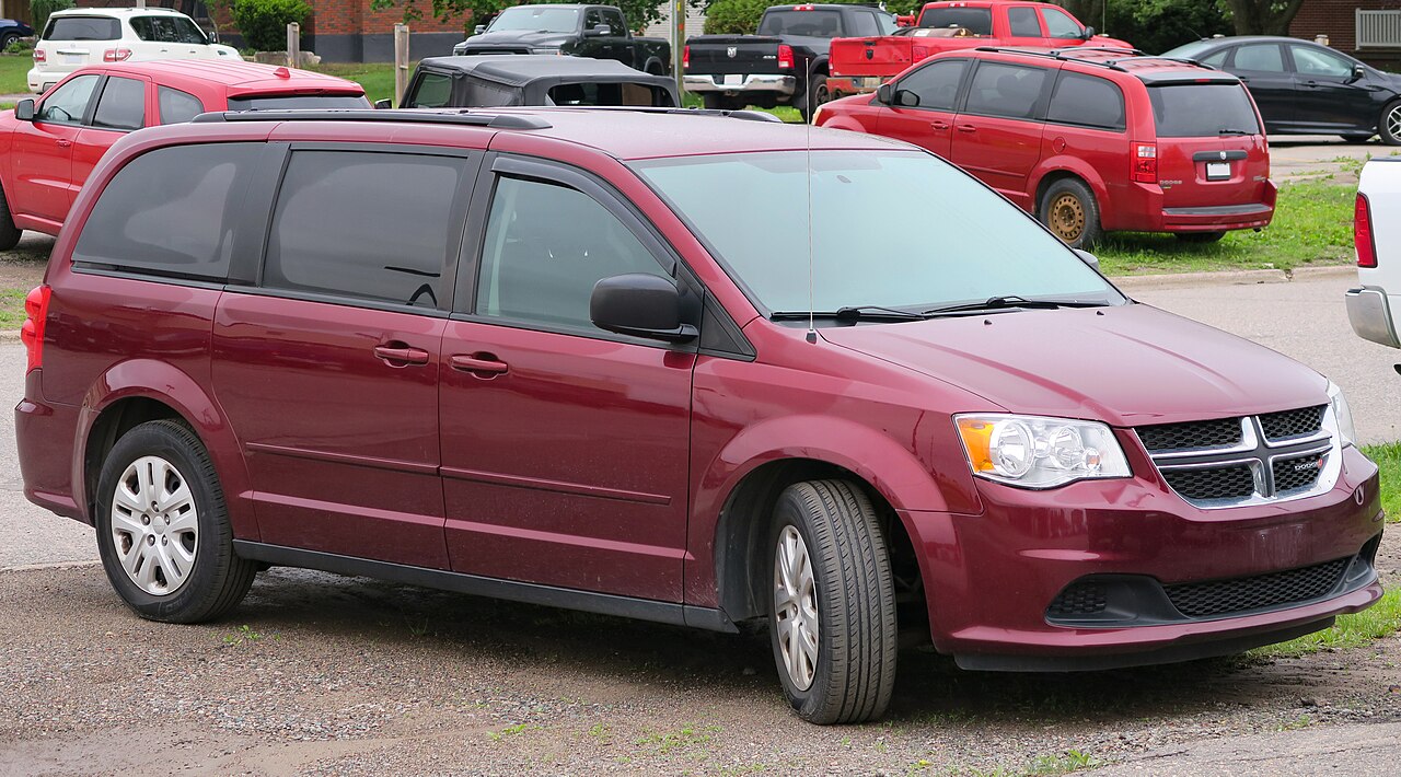 Red Dodge Grand Caravan, front right view